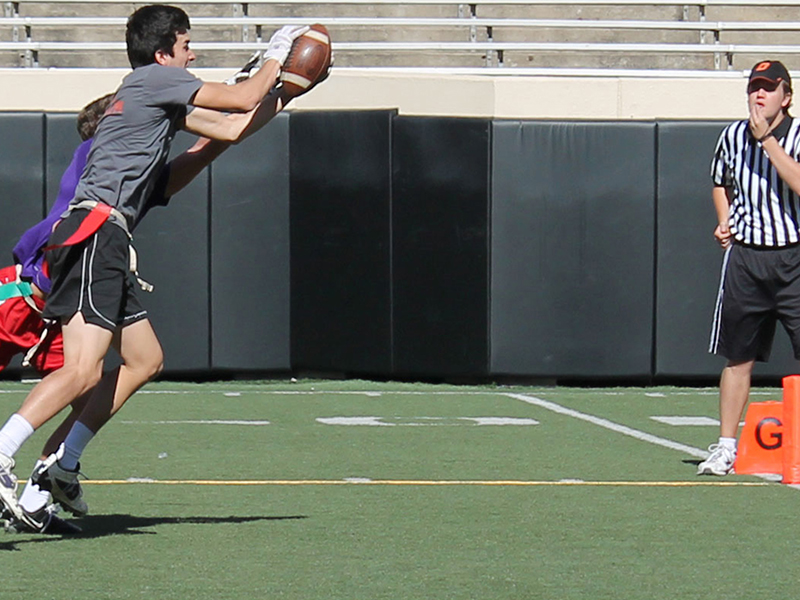 Students playing flag football